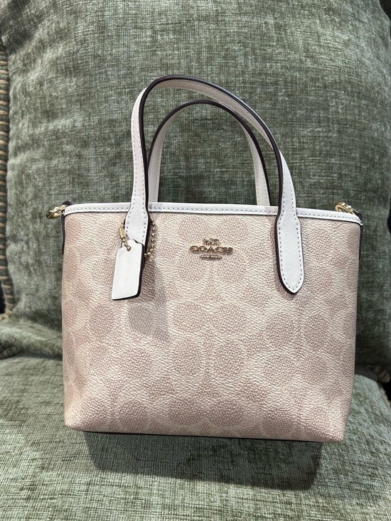 Coach Handbags - Coach Cream and White Mini Pebbled Satchel